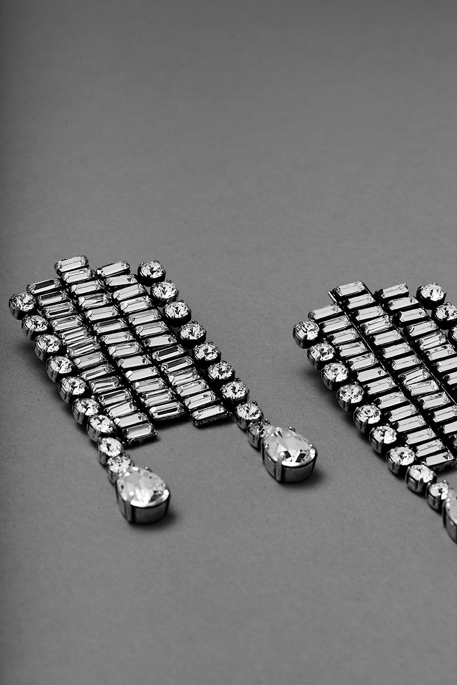 Details of AEIDES statement earrings made by ANEIDA Jewelry in silver plated brass with Swarovski crystals